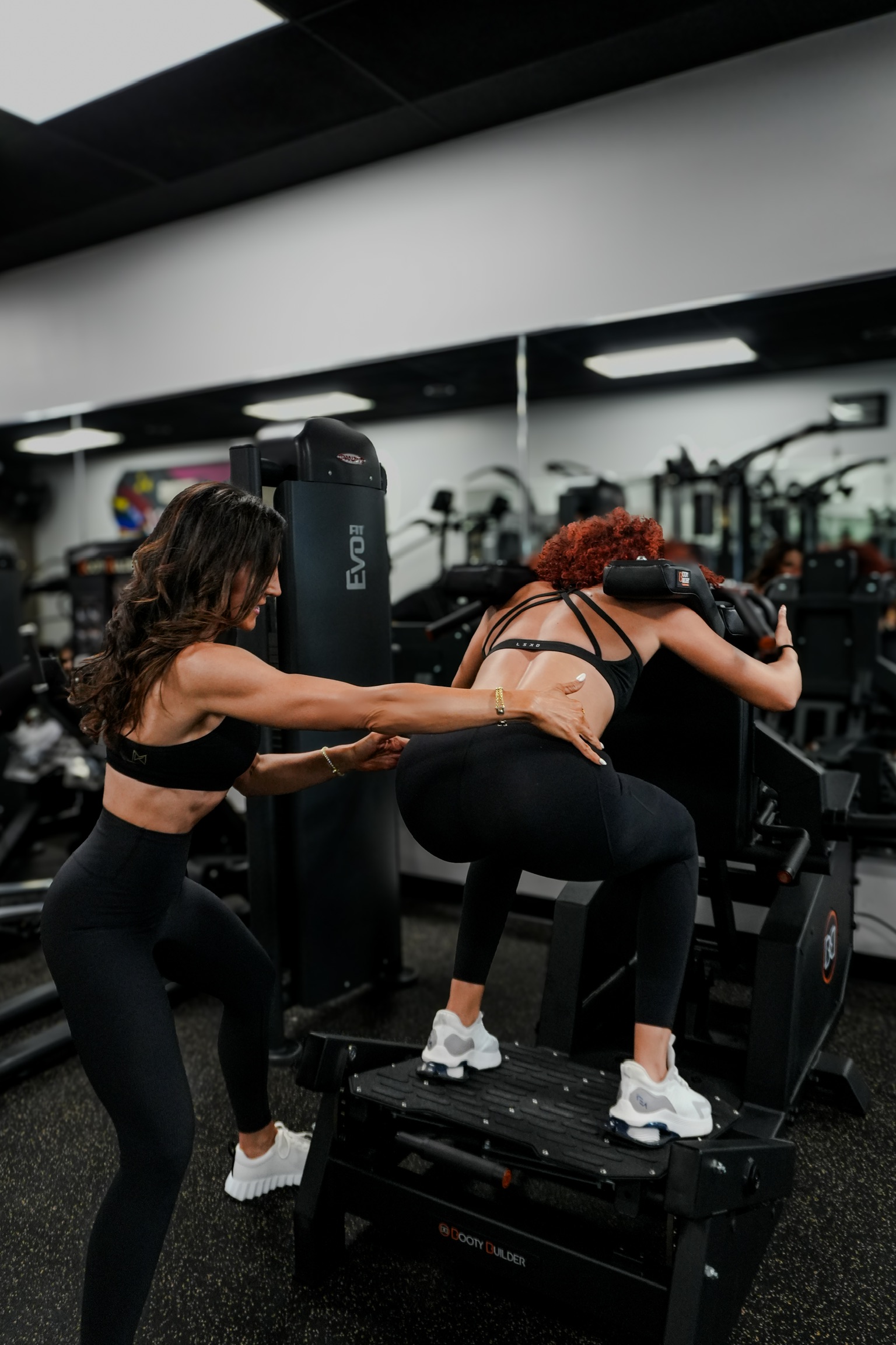 Mary coaching a client one-on-one at MK Fitness